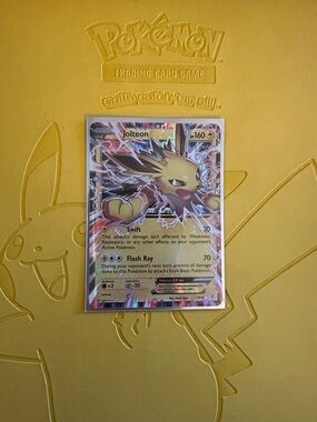 Pokémon Jolteon EX Collectible Holo Card - Yellow Artwork